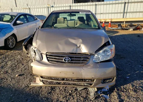 2004 Toyota Corolla Ce z USA, uszkodzony, nr VIN 2T1BR32E14C204990